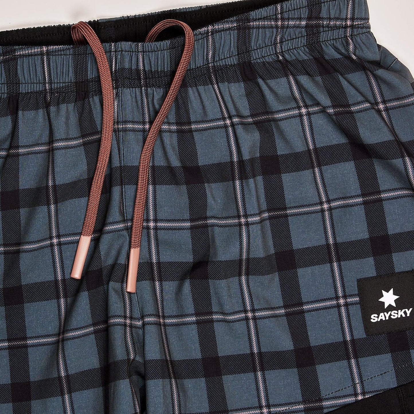 2 IN 1 CHECKER PACE SHORTS 3'' - DAME | ActSporty