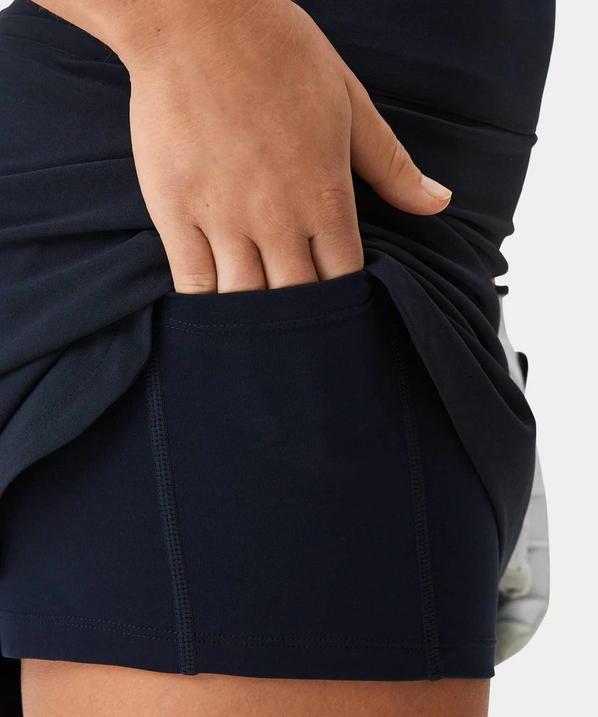KAYA FLEX SKORT | DARK BLUE - MACADE GOLF