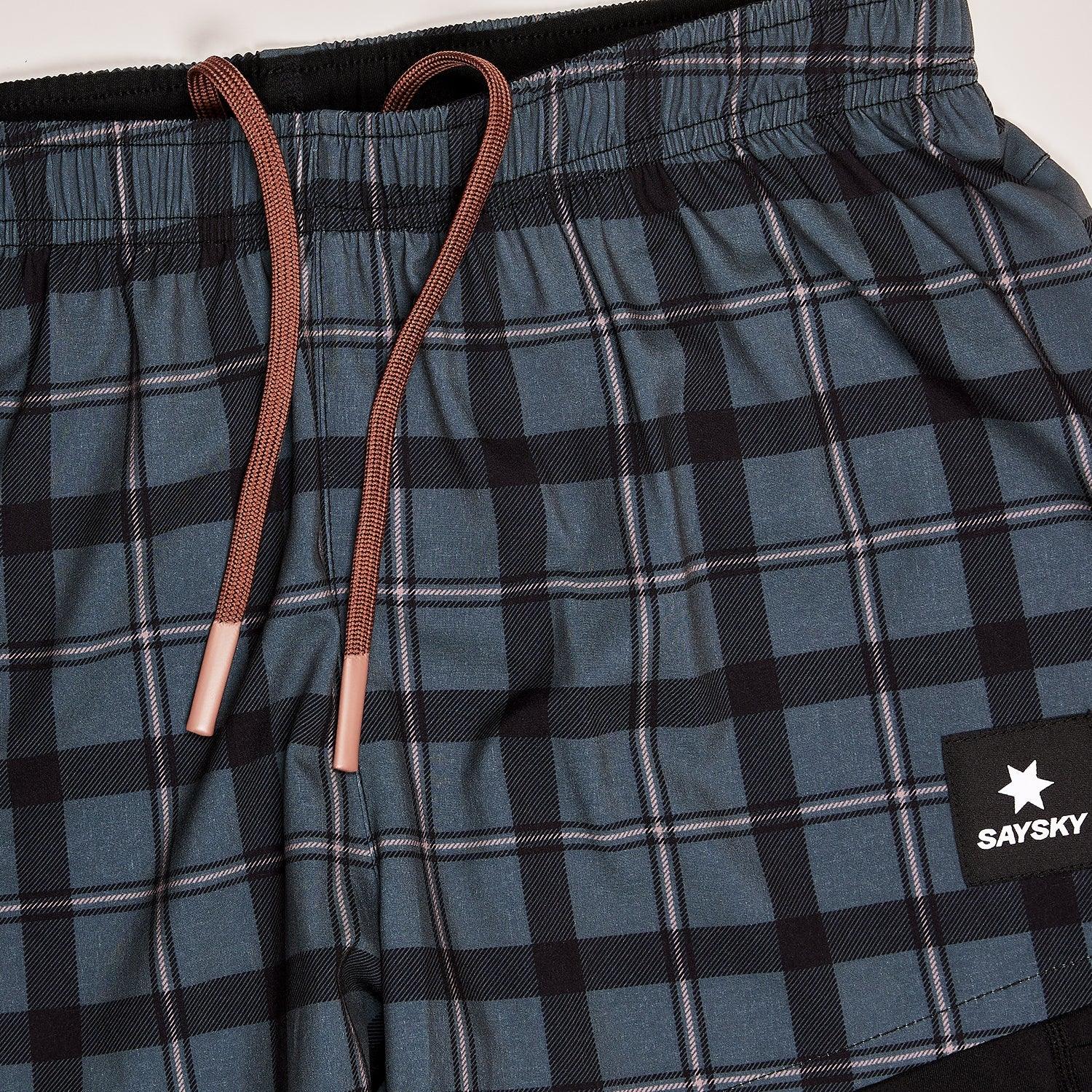 2 IN 1 CHECKER PACE SHORTS 3'' - DAME | ActSporty 